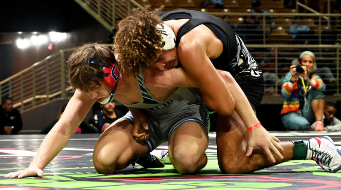 Jordan Mills of Matanzas wins 3-1 in the 190-pound title match against Lucas Szymborso of Cleveland on Saturday at the Knockout Christmas Classic at Silver Spurs Arena in Kissimmee.